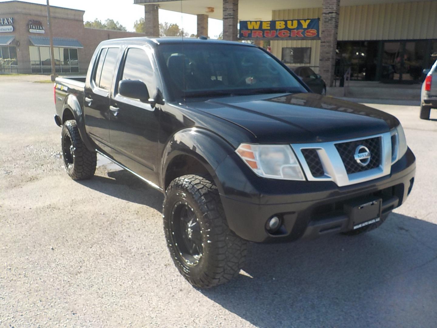 2016 Black /Black Nissan Frontier (1N6AD0ER1GN) , Automatic transmission, located at 1617 W Church Street, Livingston, TX, 77351, (936) 327-3600, 30.710995, -94.951157 - This truck would be great for a first time vehicle!! Or anything else for that matter - Photo#1